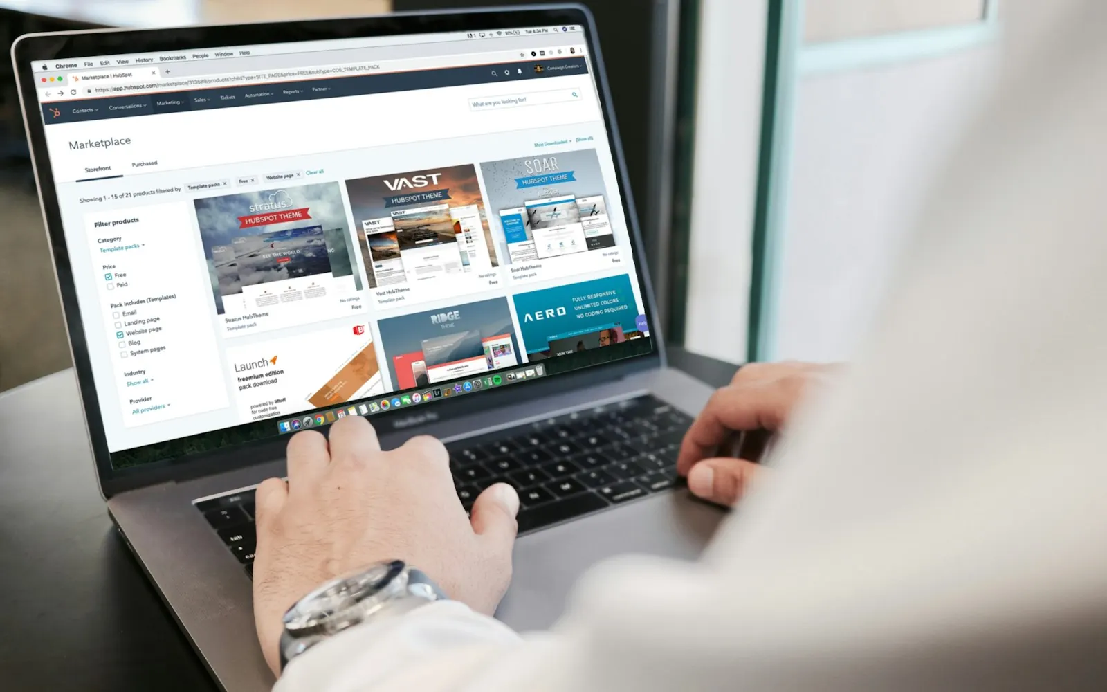 A person browsing a website on a laptop after clicking a Birmingham Google Ads result