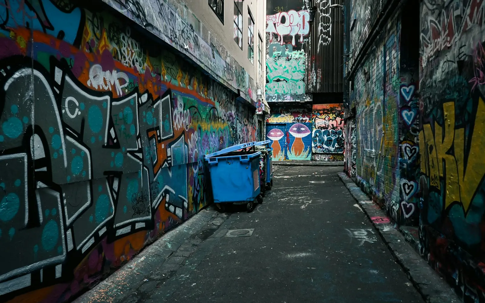 Graffiti and street art covering the walls of a narrow laneway in Melbourne's CBD