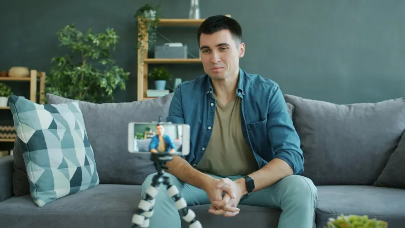 Creator recording a social video on a phone tripod